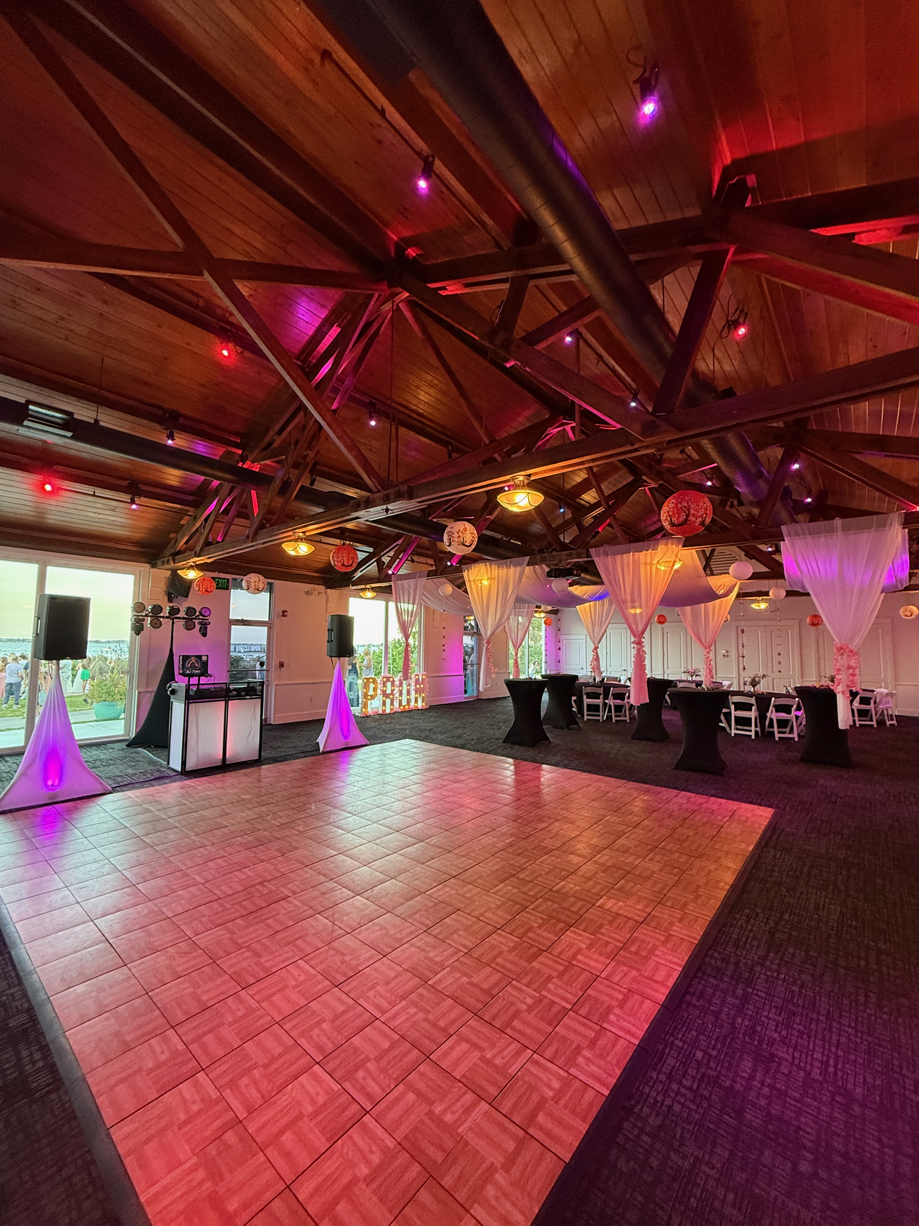 Full DJ setup and dance floor at Prom 2K26 venue